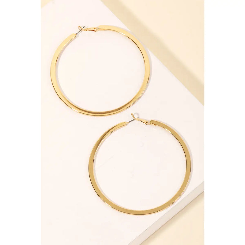 Gold Flat Latch Hoop Earrings at Sew Bonita in Corpus Christi, TX.