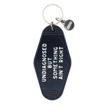Something Ain't Right Hot Stamped Motel Keychain