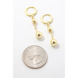 Gold Double Ball Drop Earrings at Sew Bonita in Corpus Christi, TX.