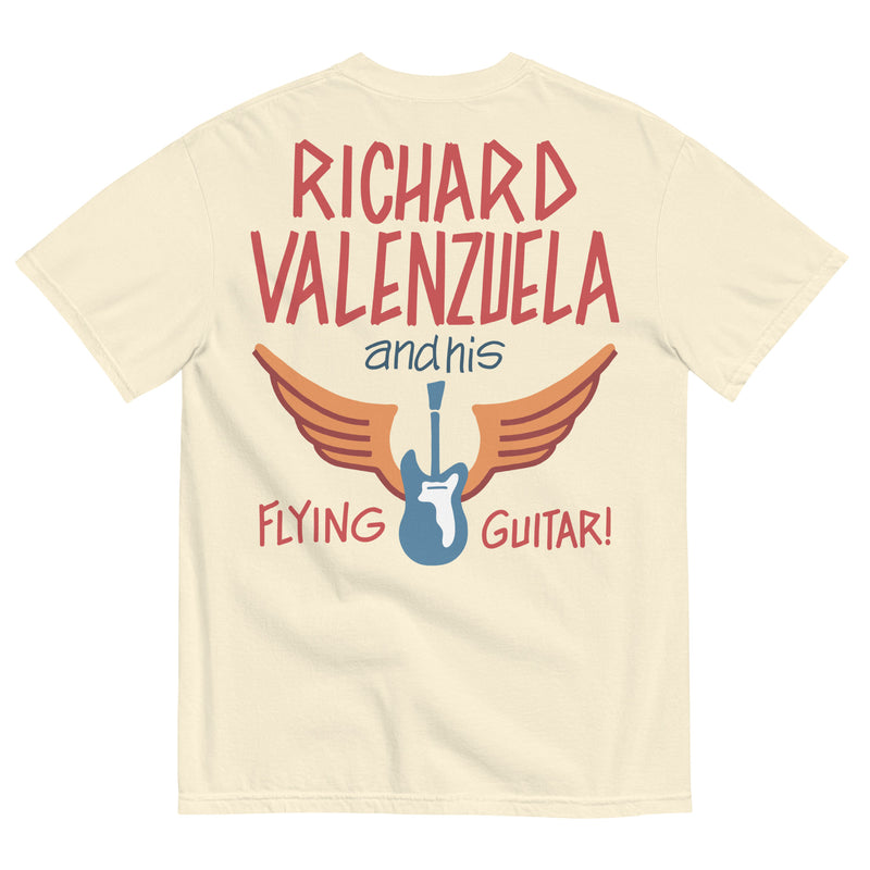 Cream colored Comfort Colors shirt with vintage-style text that reads 'Richard Valenzuela and his Flying Guitar' with an image of a blue guitar and orange wings from Sew Bonita in Corpus Christi, Texas