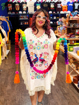 Large Rainbow Pom Garland at Sew Bonita in Corpus Christi, TX.